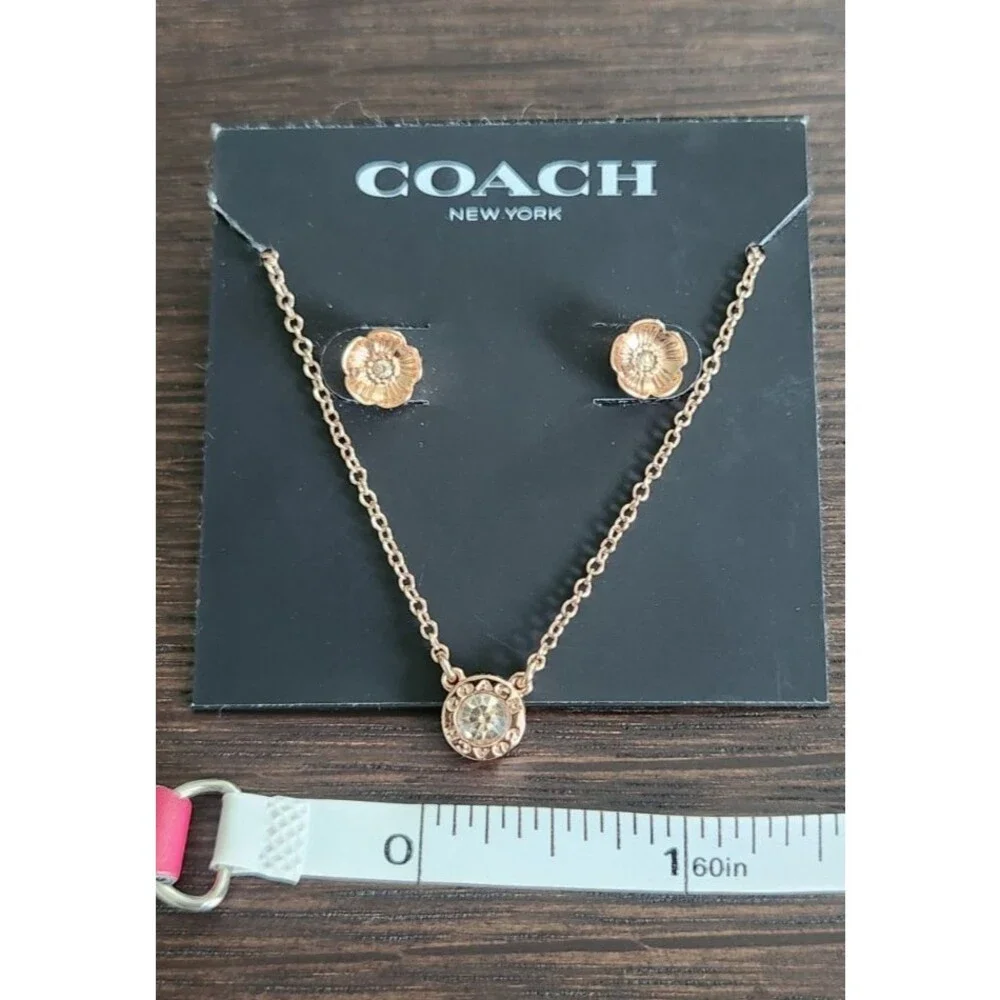 COACH Rose Gold Halo Necklace and Matching Flower Earring Set MSRP. $125
